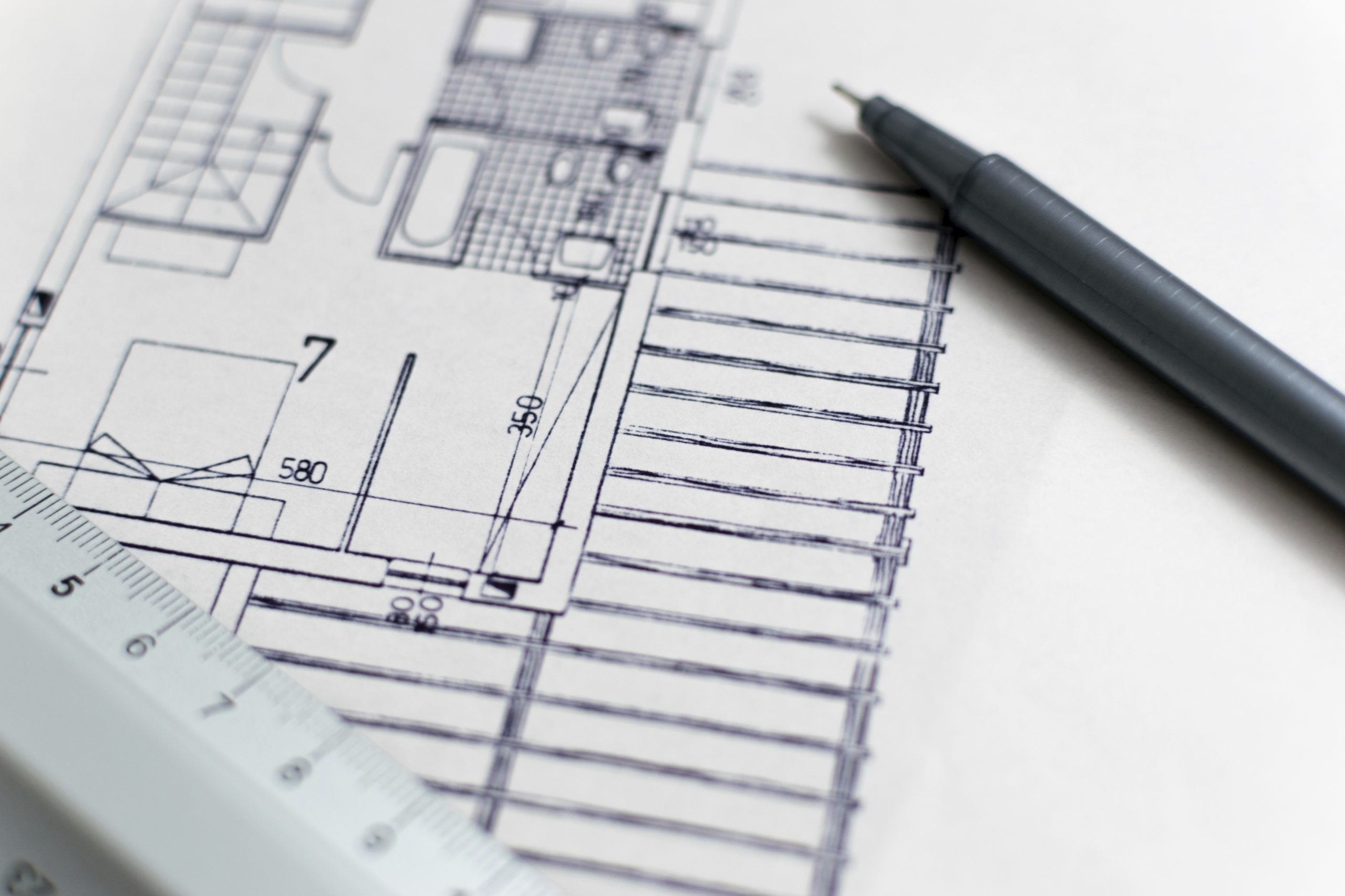 Building plans spread on a table