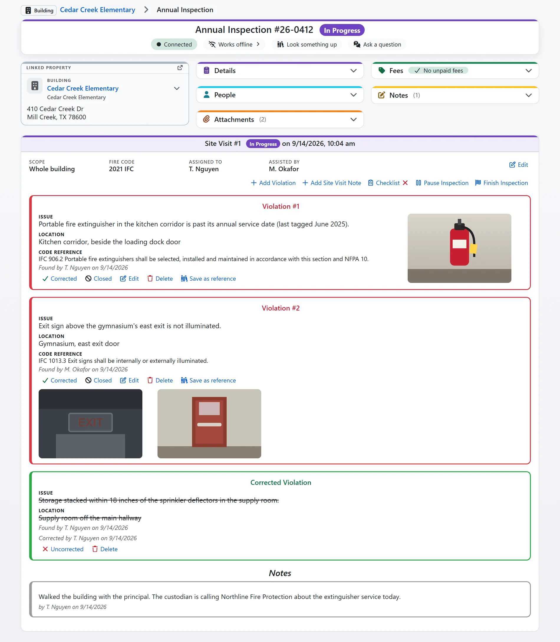 An annual inspection in progress in FireInspection360: the site visit card with two open violations, one with a photo, the checklist button and the Finish Inspection action (sample data)
